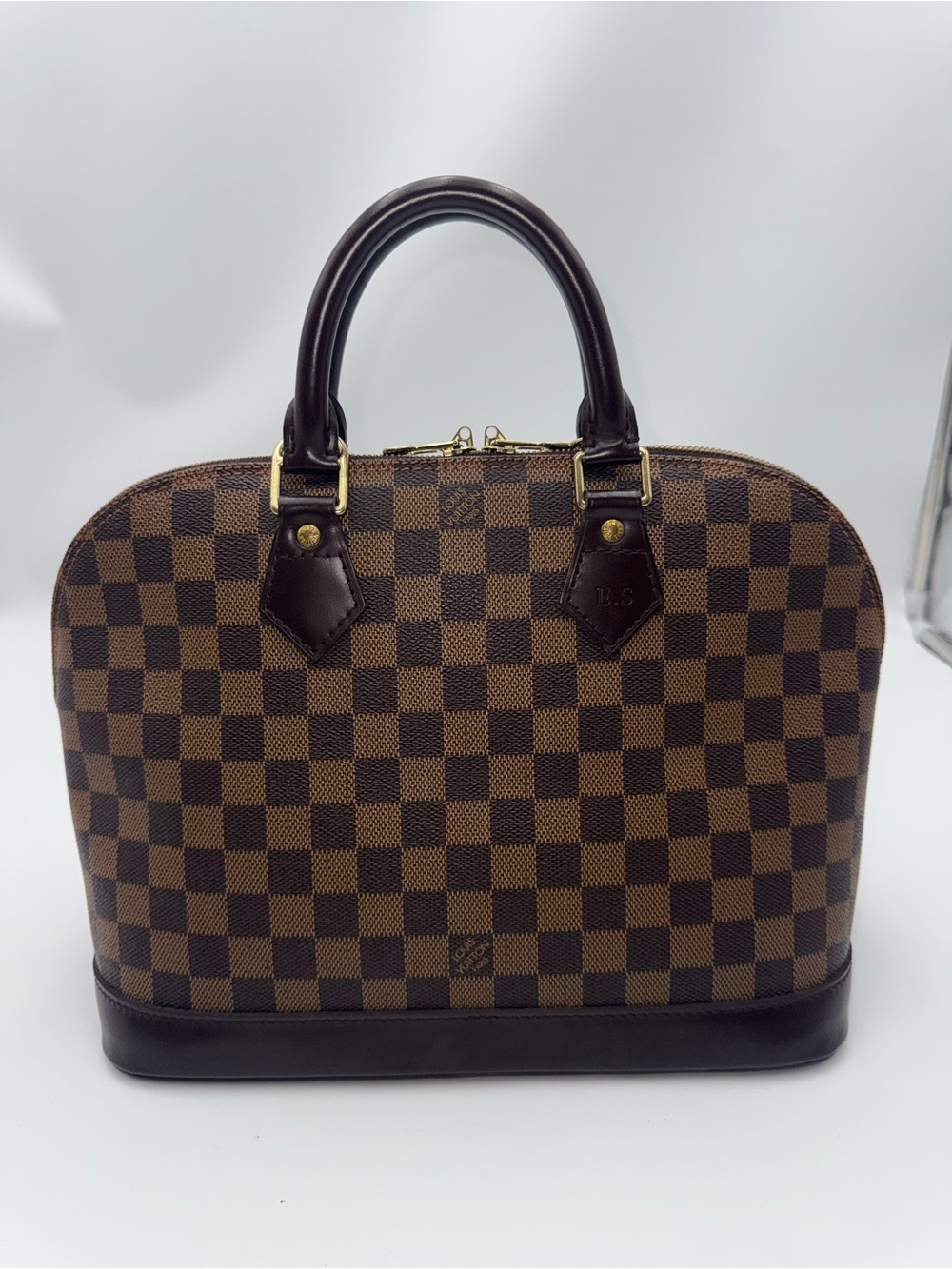 Louis Vuitton Damier Ebene Alma satchel in PM size